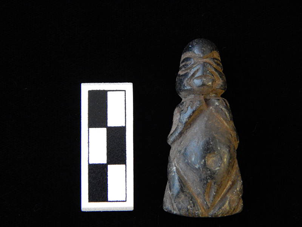 Stone (steatite) anthropomorphic sculpture interpreted to be female infant