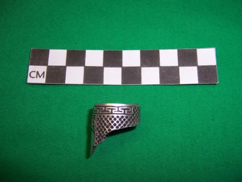 silver thimble from side