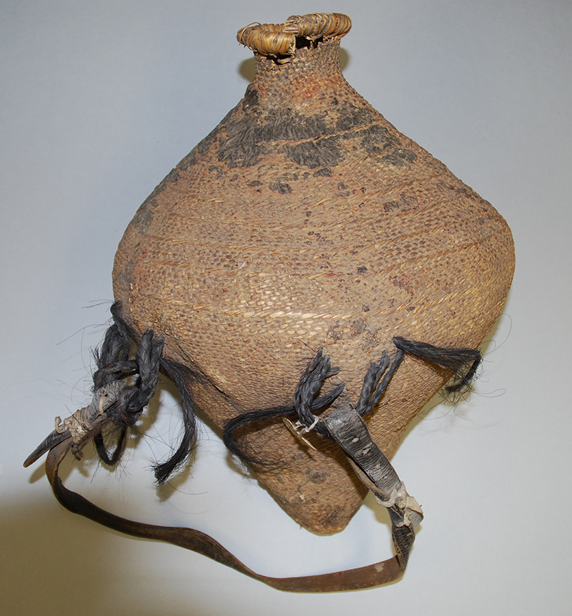 urn-shaped woven basket with leather strap